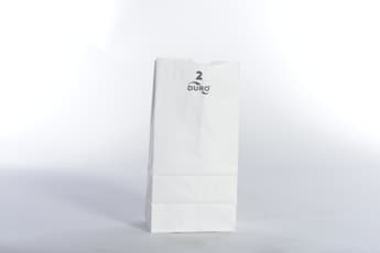 4 5/16" x 2 7/16" x 7 7/8" White Paper Bag - Image 1