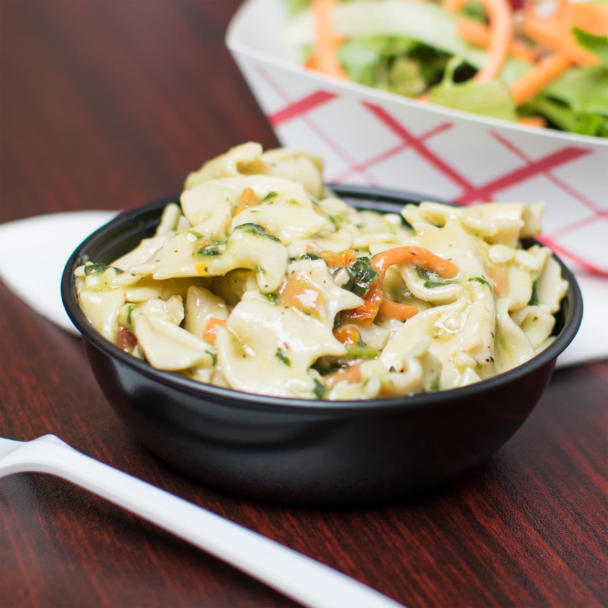 Solo Sauces, Sides, and Sweets™ DSS5 5.5 oz. Black Wide Sauce / Portion Cup - Image 1