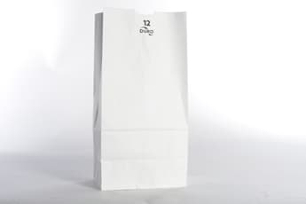 7 1/16" x 4 1/2" x 13 3/4" White Paper Bag - Image 1
