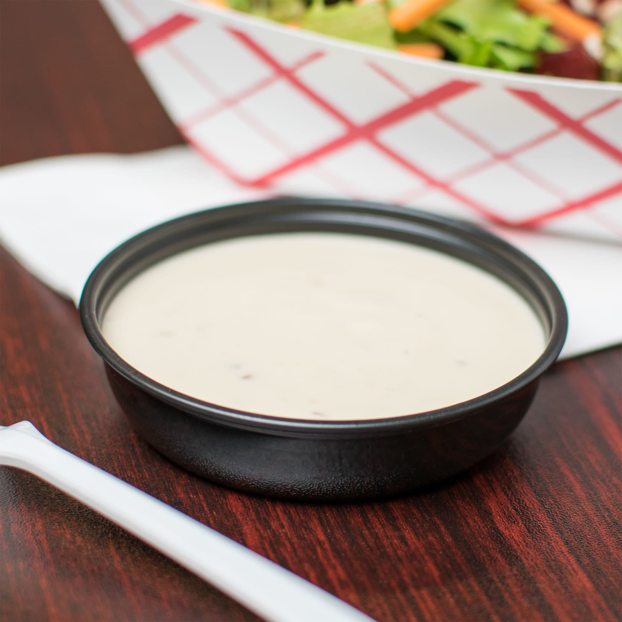 Solo Sauces, Sides, and Sweets™ DSS2 2.5 oz. Black Wide Sauce / Portion Cup - Image 1